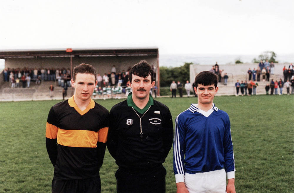 1991 Co. U-14 Football Final in Castleisland Tommy Griffin (Austin Stacks Captain), Tom McCarthy (referee), John O Sullivan (Laune Rangers Captain).