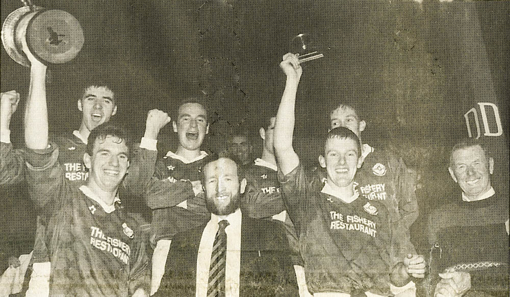 Mike Hassett (capt.) 1995 received the Co. U-21 Football Trophy from Sean Kelly, while Liam Hassett received the man-of-the-match award