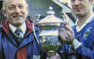 Pa O Sullivan (captain) received the O Connor Cup from John Twiss, Chairman Mid-Kerry Board.